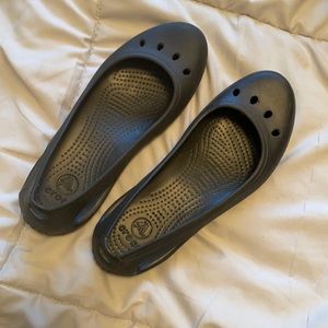 Crocs black slip on shoes